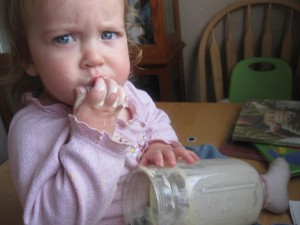 baby eating cream picture