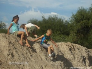children playing on rock  pic