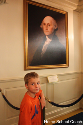kid with president epcot picture