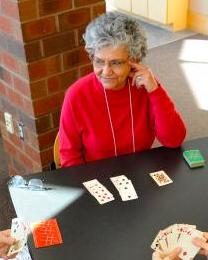 old lady playing bridge picture