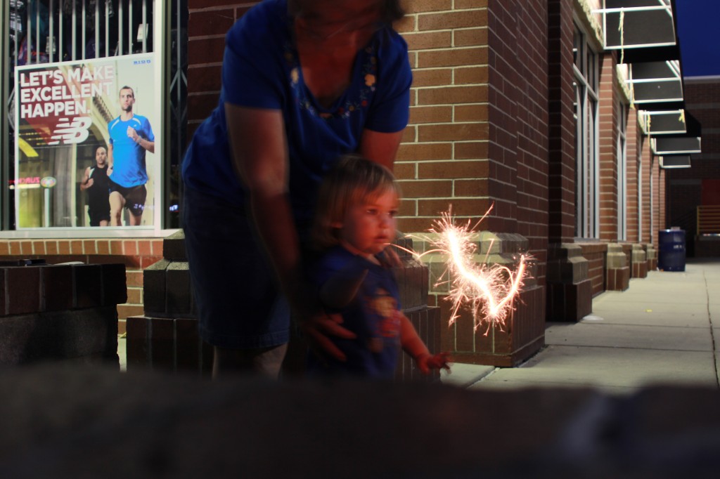 kid with sparklers picture