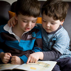 Family reading together pictures