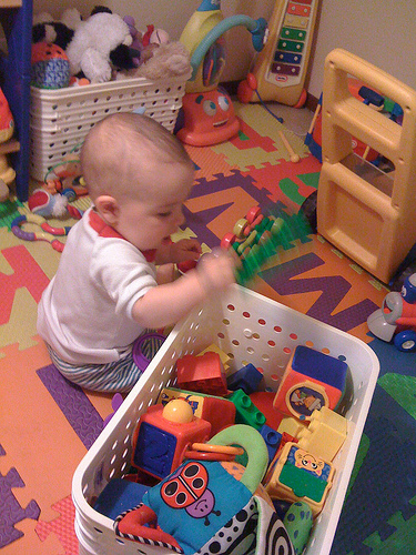 baby playing with toys pictures