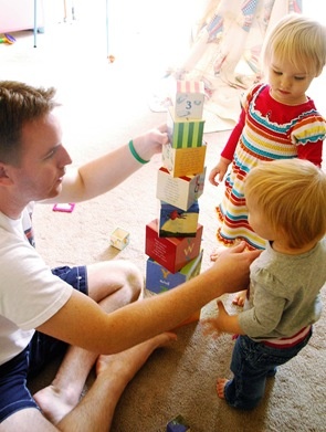 family playing blocks pictures