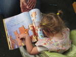 small girl reading photos
