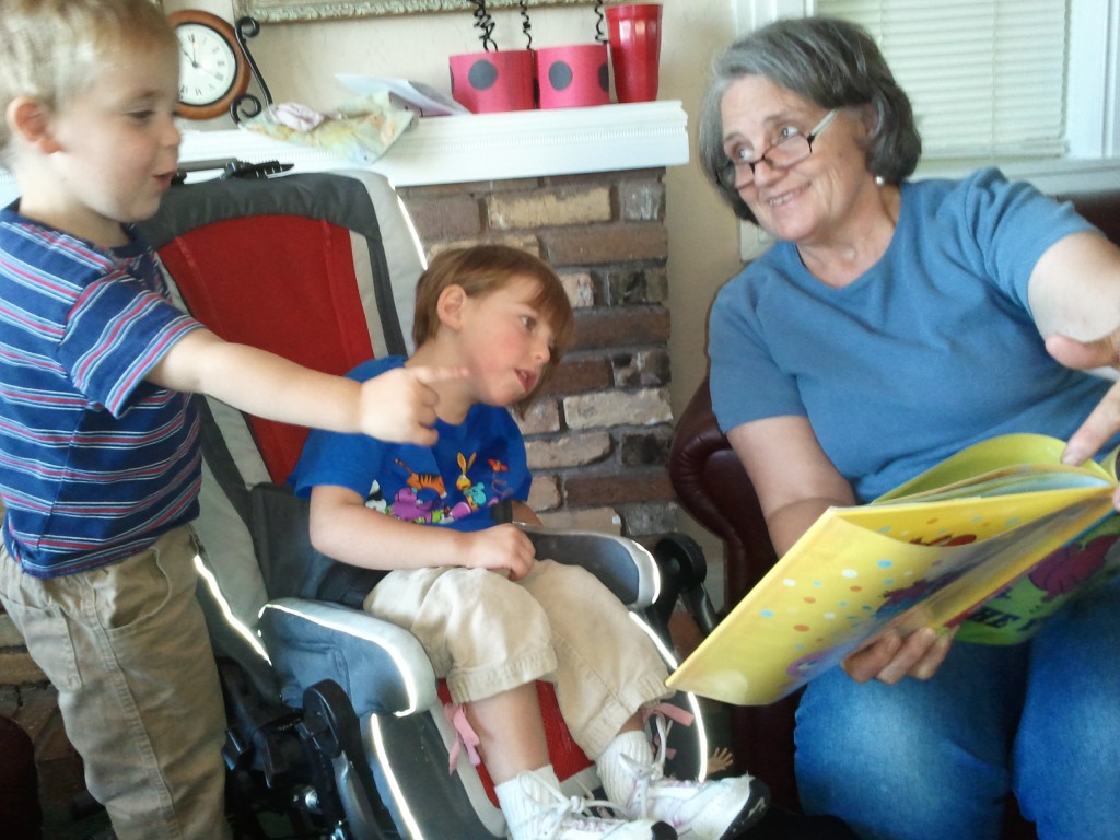 grandma and kids reading zoology books 