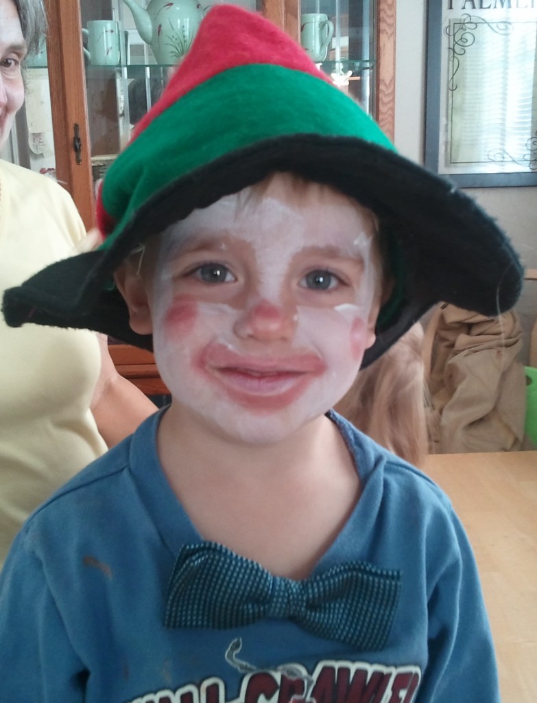 little boy dressed as clown