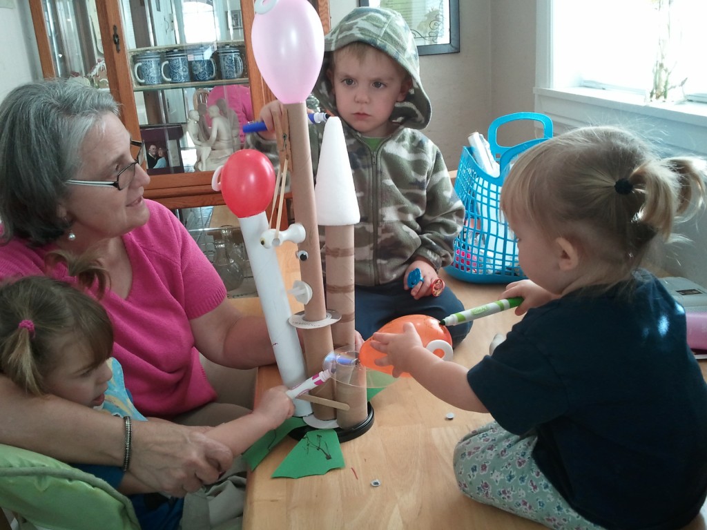 kids with their rocket propelled robot invention